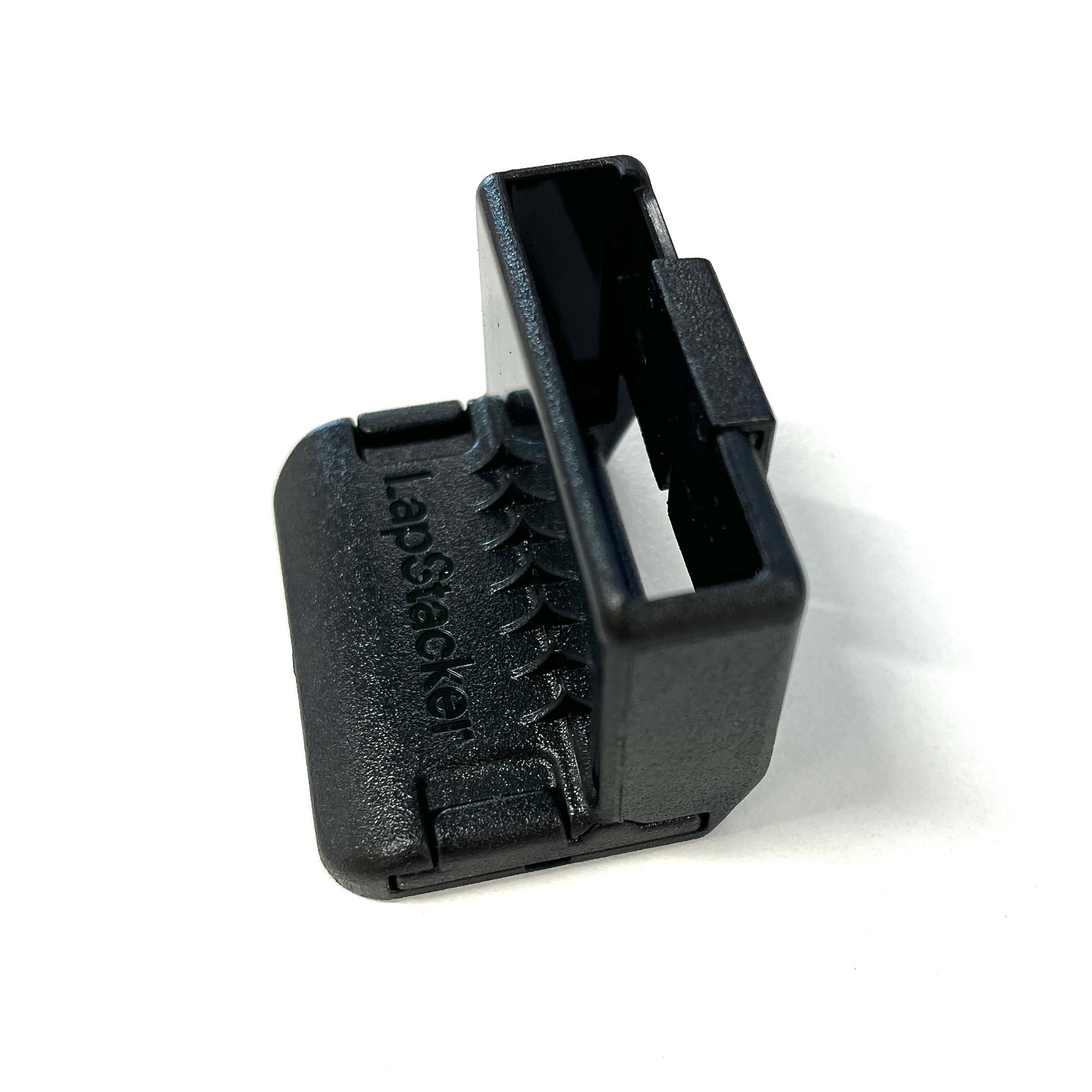 Black LapStacker Flex Top Buckle Holder plastic component with branding on a white background
