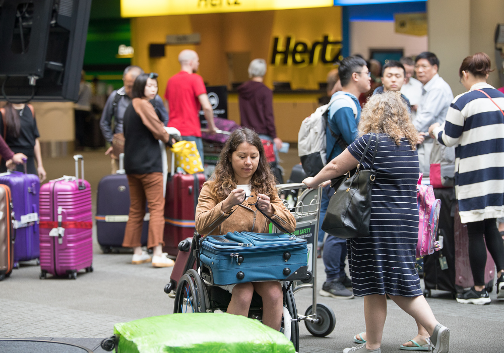 How to carry things in a wheelchair at the airport: a practical guide.