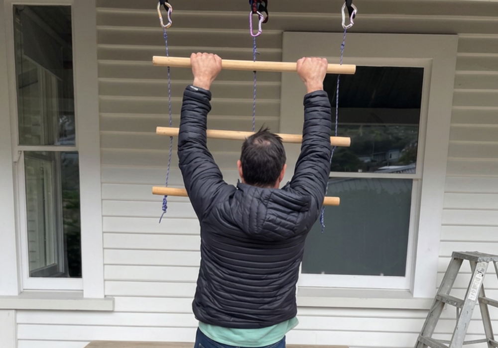 Dead hangs for shoulder health: my DIY hanging bars.