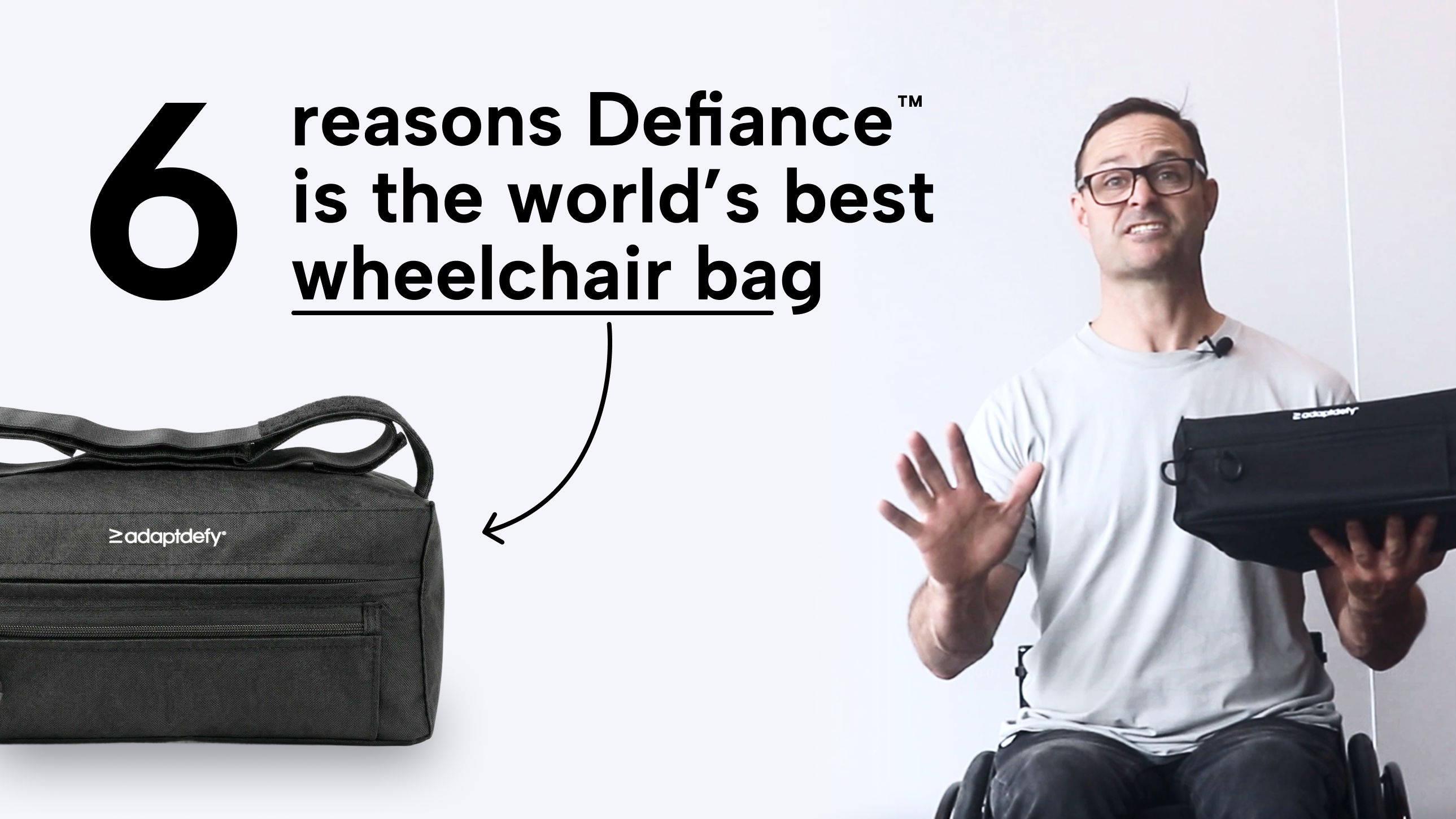 YouTube video thumbnail showing AdaptDefy founder Mike Brown in a manual wheelchair holding the Defiance™ wheelchair bag, with bold text reading "6 reasons Defiance™ is the world's best wheelchair bag"