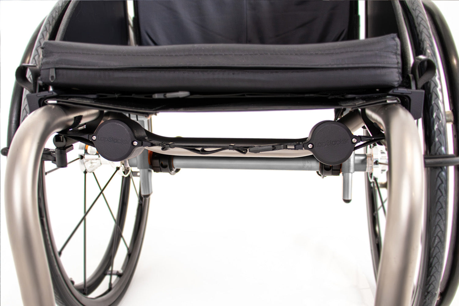 LapStacker Flex installed horizontally, using straps around the frame of a manual wheelchair