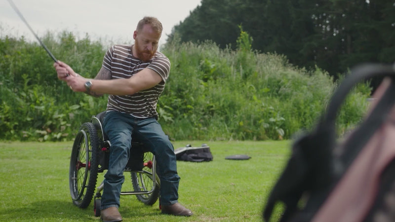 Video montage showing a series of shots of wheelchair users in a variety of locations, including in the outdoors, around town, adaptive skiing, adaptive surfing, and using LapStacker, looking confident and happy. 