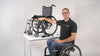 In this video a man in a wheelchair shows you how to install a LapStacker Flex vertically on a dual frame manual folding wheelchair. 